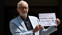 Jeremy Corbyn outside Islington Town Hall in June (AFP)