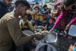 A charity organization distributes food, “Takiya,” to displaced Palestinians, in the Gaza Strip. In Gaza, UNRWA said that the situation is becoming more disastrous, on February 9, 2024