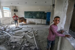 Palestinians at the site of an Israeli airstrike at an United Nations (UNRWA) school in the Nuseirat camp in the central Gaza Strip, on July 15, 2024