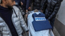 the funeral for a journalist who was killed in Gaza