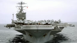 a us aircraft carrier in the ocean