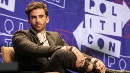hasan piker sitting in a chair