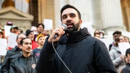 zohran mamdani speaks at a rally