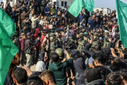 Palestinian resistance hands over Israeli prisoners to the Red Cross, as part of the ceasefire agreement between Israel and Hamas, in Khan Yunis, southern Gaza Strip, on January 30, 2025.