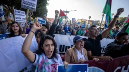 Community organizers protest outside the Federal Building following an immigration enforcement operation by federal authorities on Friday, June 6, 2025, in Los Angeles.