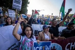Community organizers protest outside the Federal Building following an immigration enforcement operation by federal authorities on Friday, June 6, 2025, in Los Angeles.