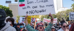 Protesters attend a demonstration calling for “No War on Iran,” “No War on Immigrants,” and “No War on Palestine” at Pershing Square in downtown Los Angeles on June 21, 2025.