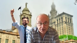 zohran mamdani and richard wolff over backdrop of NYC city hall
