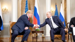 putin and trump shaking hands