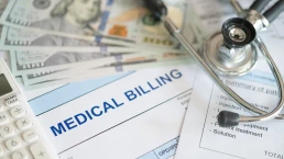 medical billing document and dollar banknote, calculator, stathoscope. medical treatment expense concept.