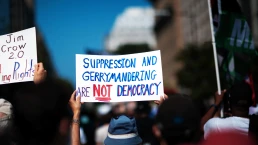 voter supression and gerrymandering protest sign