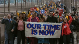 our time is now banner led by zohran mamdani