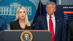 pam bondi at podium near donald trump