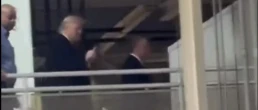 trump at ford factory giving middle finger to worker who yelled about epstein