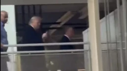 trump at ford factory giving middle finger to worker who yelled about epstein