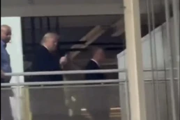 trump at ford factory giving middle finger to worker who yelled about epstein