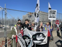 ann wright protesting in minneapolis with veterans for peace