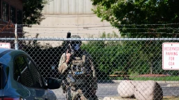 Chicago, Illinois, United States - September 26 2025: Border police agent stands by fence outside of the Broadview ICE detention Center in Chicago