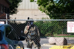 Chicago, Illinois, United States - September 26 2025: Border police agent stands by fence outside of the Broadview ICE detention Center in Chicago