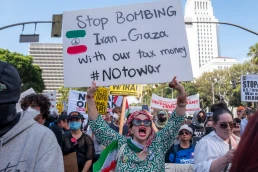 Protesters attend a demonstration calling for “No War on Iran,” “No War on Immigrants,” and “No War on Palestine” at Pershing Square in downtown Los Angeles on June 21, 2025.