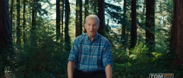Tom Steyer tv ad screenshot of Tom in the woods