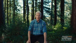 Tom Steyer tv ad screenshot of Tom in the woods