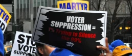 voter suppression rally sign