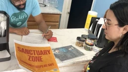 Canvassers talk to independent business owners in Atlanta to invite them to become Sanctuary Zones that prevent ICE and police from entering their establishments. (GLAHR)