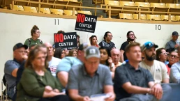 EMPORIA KANSAS, USA - JUNE 23, 2026 No Data Center Protestors inside the Civic auditorium during the town hall meeting