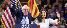 U.S. Senator Bernie Sanders and U.S. Congresswoman Alexandria Ocasio-Cortez speaking with attendees at a