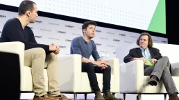 SAN FRANCISCO, CALIFORNIA - OCTOBER 03: (L-R) OpenAI Co-founder/Chairman & CTO Greg Brockman, OpenAI Co-Founder & CEO Sam Altman and TechCrunch News Editor Frederic Lardinois speak onstage during TechCrunch Disrupt San Francisco 2019 at Moscone Convention Center on October 03, 2019 in San Francisco, California. (Photo by Steve Jennings/Getty Images for TechCrunch)