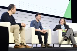 SAN FRANCISCO, CALIFORNIA - OCTOBER 03: (L-R) OpenAI Co-founder/Chairman & CTO Greg Brockman, OpenAI Co-Founder & CEO Sam Altman and TechCrunch News Editor Frederic Lardinois speak onstage during TechCrunch Disrupt San Francisco 2019 at Moscone Convention Center on October 03, 2019 in San Francisco, California. (Photo by Steve Jennings/Getty Images for TechCrunch)